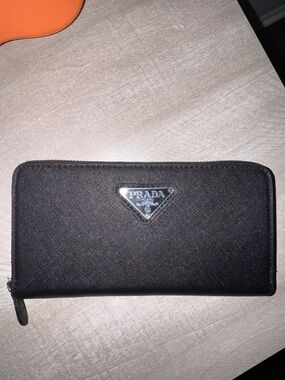 Black Saffiano Zip Around Wallet with Silver Triangle Logo